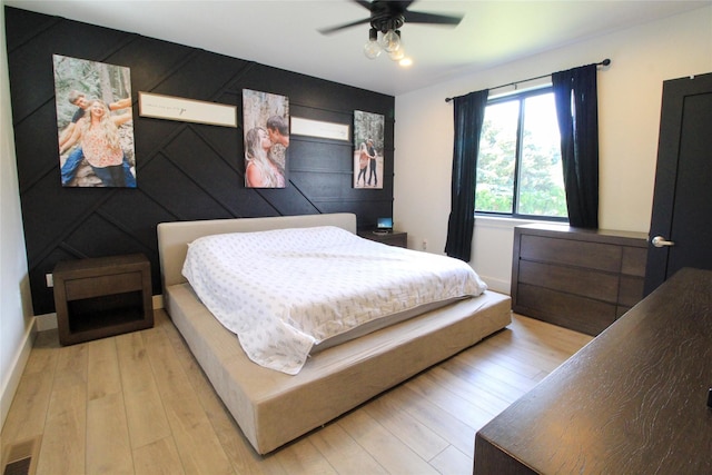 224 Columbia Meadows Dr, Columbia Falls, MT 59912 - bedroom with light wood-style floors, baseboards, and a ceiling fan