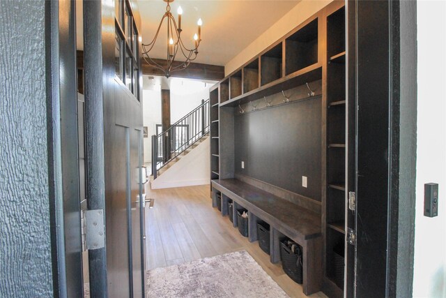 224 Columbia Meadows Dr, Columbia Falls, MT 59912 - mudroom featuring a chandelier and wood finished floors