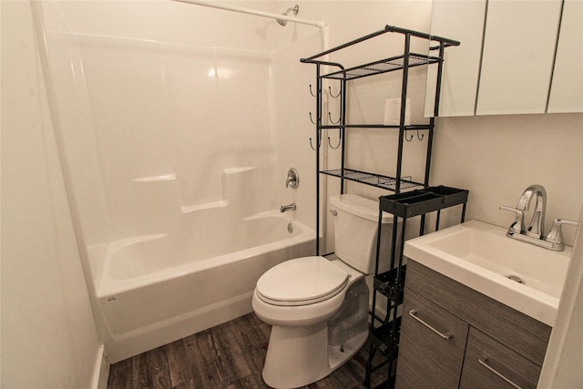 224 Columbia Meadows Dr, Columbia Falls, MT 59912 - full bathroom with toilet, shower / tub combination, wood finished floors, and vanity