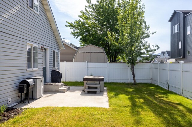 2322 Mary Jane Blvd, Missoula, MT 59808 - fenced backyard with a patio