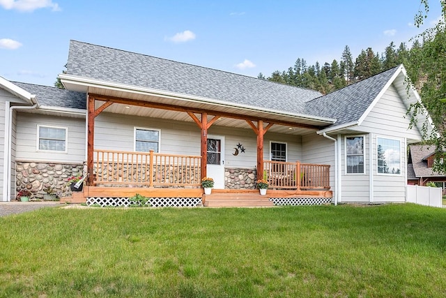 1 Cherry Ct, Clancy, MT 59634 - view of front of house with a shingled roof, a front lawn, covered porch, and stone siding