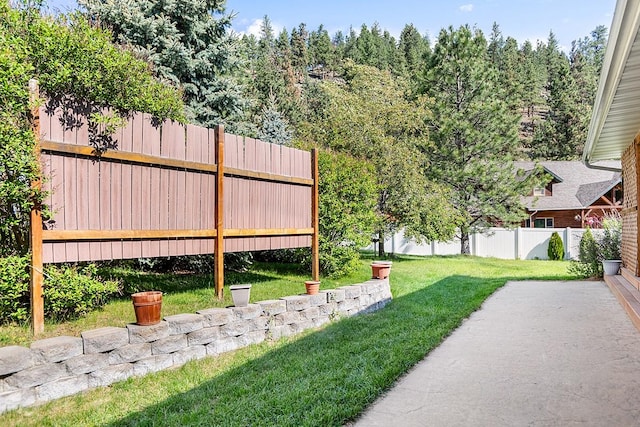 1 Cherry Ct, Clancy, MT 59634 - fenced backyard featuring a patio area