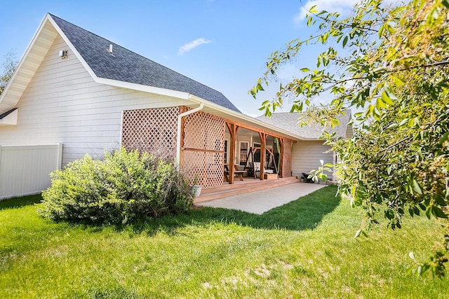 1 Cherry Ct, Clancy, MT 59634 - back of house featuring roof with shingles, a patio, and a yard