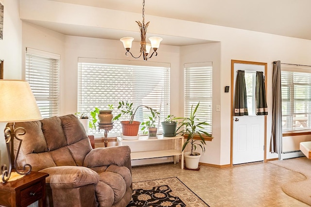 1 Cherry Ct, Clancy, MT 59634 - living area with a baseboard heating unit and a chandelier