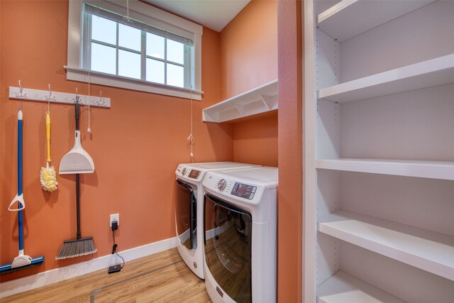 306 Mansion View Loop, Hamilton, MT 59840 - laundry area featuring independent washer and dryer, wood finished floors, and baseboards