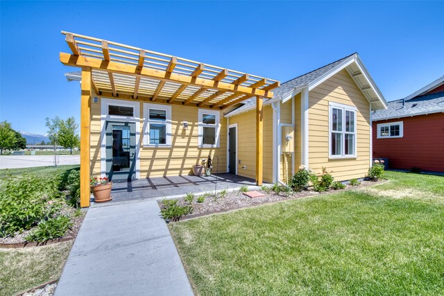 306 Mansion View Loop, Hamilton, MT 59840 - view of front of property featuring a front lawn and a pergola