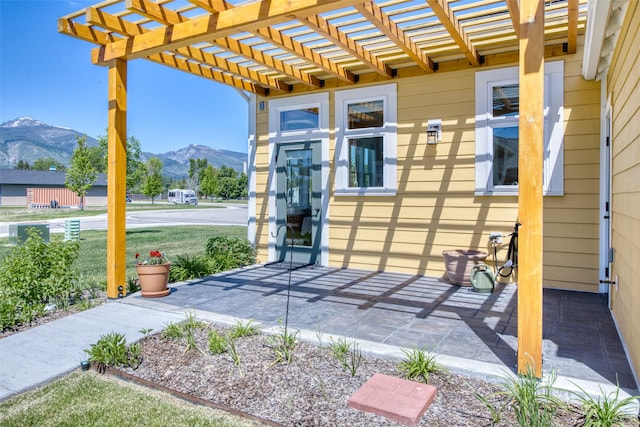 306 Mansion View Loop, Hamilton, MT 59840 - view of patio / terrace featuring a mountain view and a pergola
