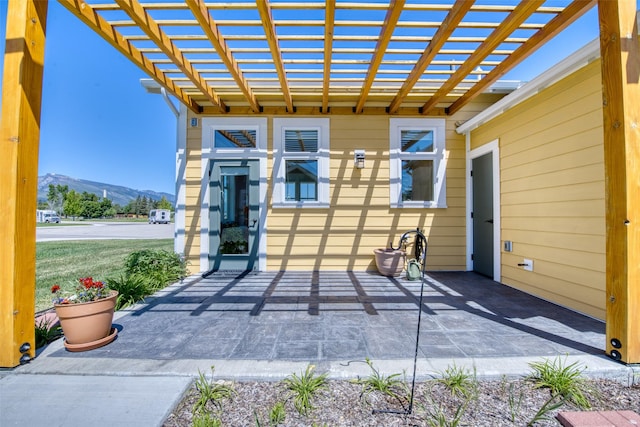 306 Mansion View Loop, Hamilton, MT 59840 - view of patio featuring a mountain view and a pergola