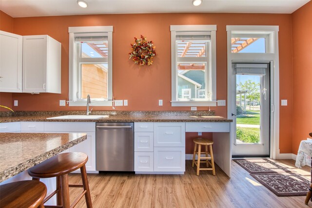 306 Mansion View Loop, Hamilton, MT 59840 - kitchen with dishwasher, a sink, light wood-type flooring, healthy amount of natural light, and recessed lighting