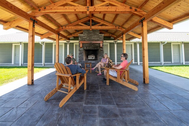306 Mansion View Loop, Hamilton, MT 59840 - view of patio / terrace featuring an outdoor stone fireplace