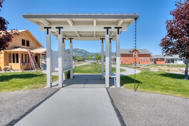 306 Mansion View Loop, Hamilton, MT 59840 - view of patio with mail area and a mountain view