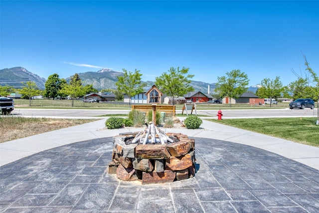 306 Mansion View Loop, Hamilton, MT 59840 - view of patio with a mountain view and a fire pit