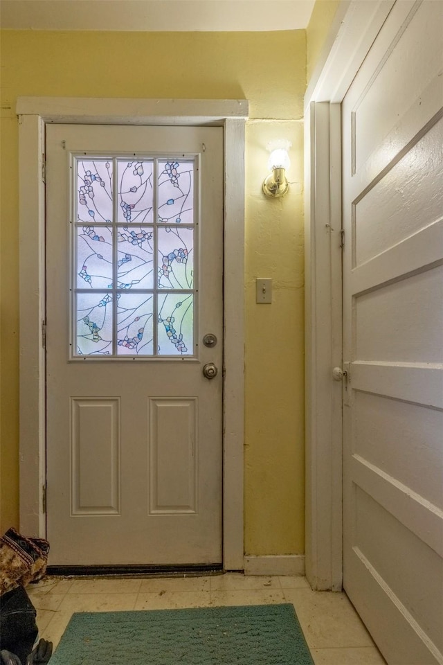 1024 N Warren St, Helena, MT 59601 - doorway with light tile patterned floors