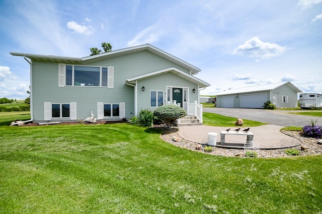 265 Fisher Rd, Great Falls, MT 59405 - back of property featuring a lawn and a detached garage