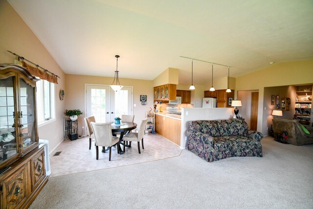 265 Fisher Rd, Great Falls, MT 59405 - dining room with vaulted ceiling, light colored carpet, and french doors