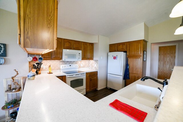 265 Fisher Rd, Great Falls, MT 59405 - kitchen with white appliances, a sink, light countertops, decorative backsplash, and lofted ceiling