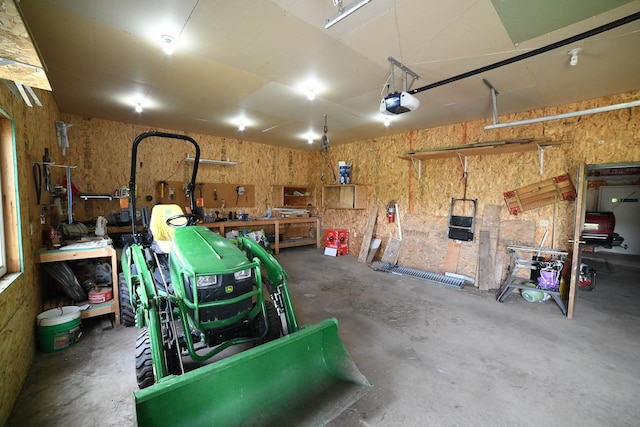 265 Fisher Rd, Great Falls, MT 59405 - garage with a workshop area and a garage door opener