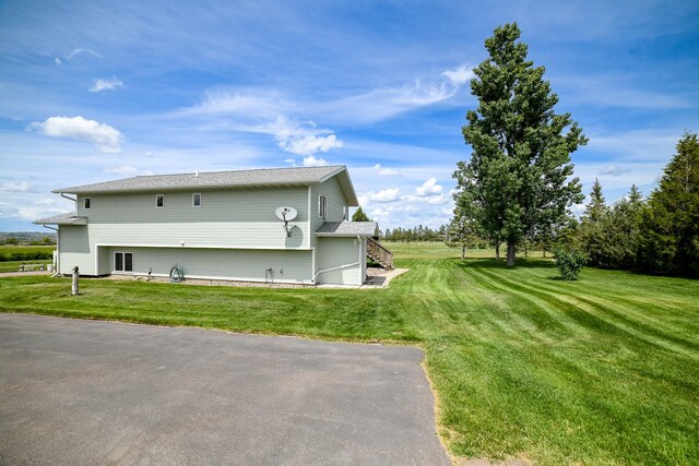 265 Fisher Rd, Great Falls, MT 59405 - view of side of home featuring a yard