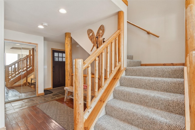 322 Wood Run Dr Unit B, Whitefish, MT 59937 - staircase with baseboards, hardwood / wood-style floors, and recessed lighting