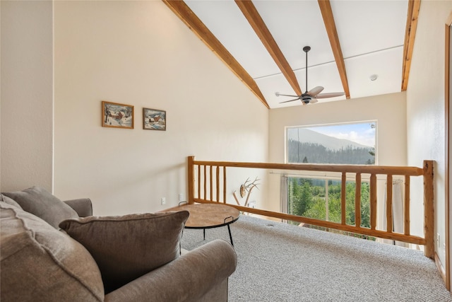 322 Wood Run Dr Unit B, Whitefish, MT 59937 - carpeted living room featuring ceiling fan, beam ceiling, and high vaulted ceiling