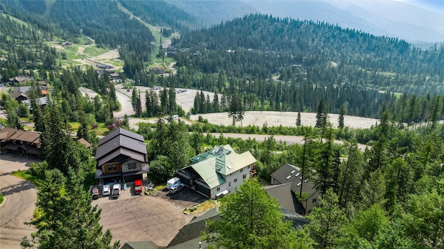 322 Wood Run Dr Unit B, Whitefish, MT 59937 - drone / aerial view of a forest and mountains