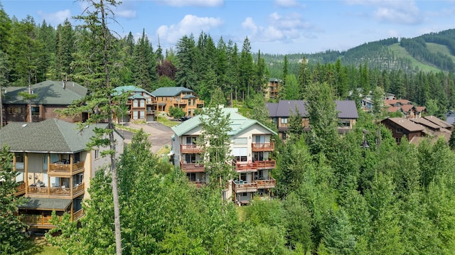 322 Wood Run Dr Unit B, Whitefish, MT 59937 - aerial perspective of suburban area with a heavily wooded area
