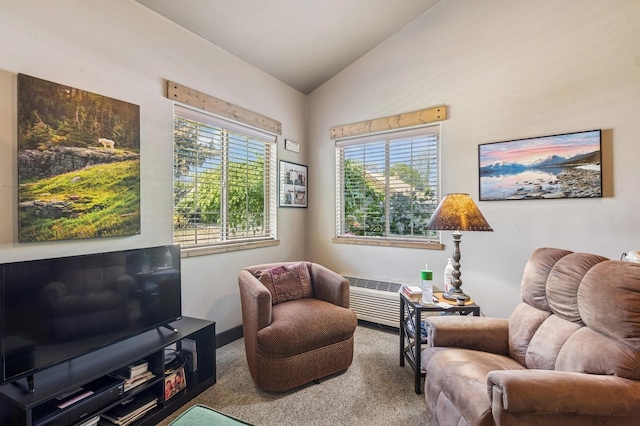 119 5th Ave W, Kalispell, MT 59901 - carpeted living room featuring vaulted ceiling and a wall mounted AC