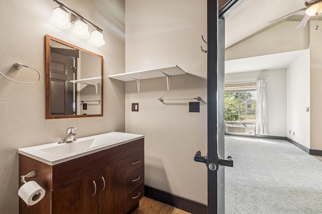119 5th Ave W, Kalispell, MT 59901 - bathroom featuring vanity, a ceiling fan, baseboards, and lofted ceiling