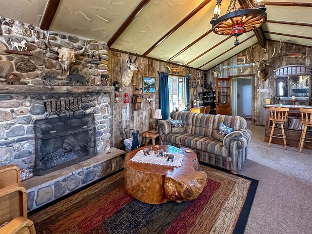 481 24th Rd NE, Dutton, MT 59433 - carpeted living area featuring a stone fireplace