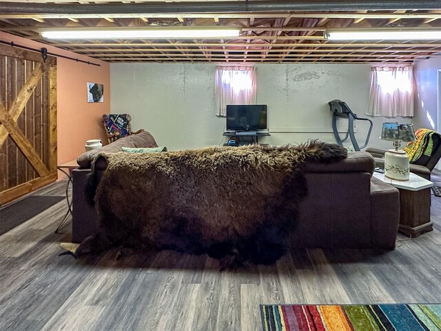 481 24th Rd NE, Dutton, MT 59433 - living area featuring wood finished floors and a barn door