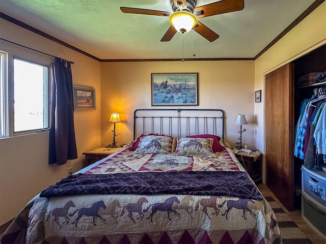 481 24th Rd NE, Dutton, MT 59433 - bedroom featuring a ceiling fan, ornamental molding, and a closet