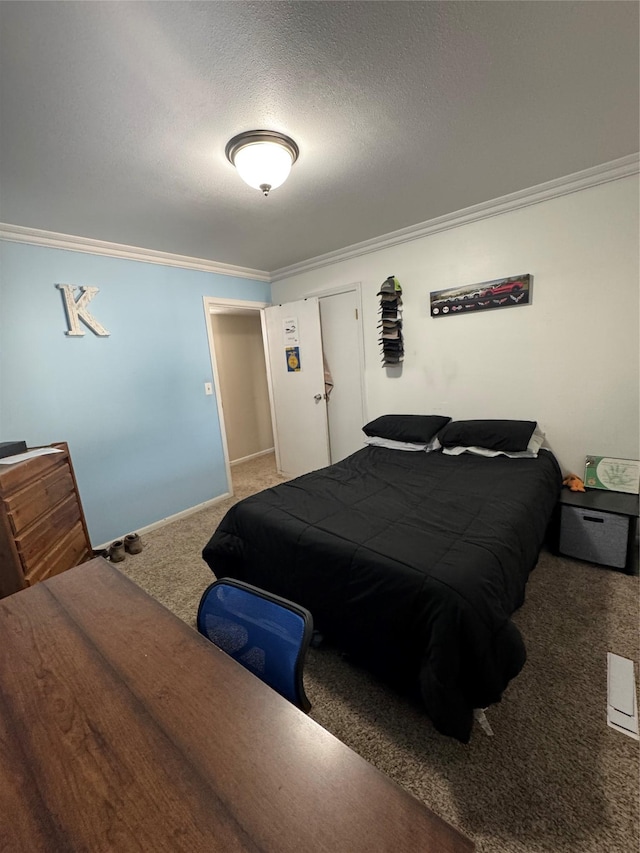 1631 Juniper Dr, Havre, MT 59501 - carpeted bedroom with crown molding, a textured ceiling, and baseboards