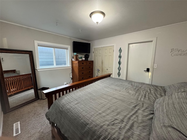 1631 Juniper Dr, Havre, MT 59501 - carpeted bedroom featuring multiple closets