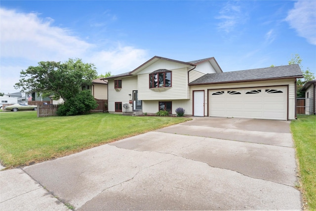 417 56th St S, Great Falls, MT 59405 - split foyer home featuring an attached garage and driveway
