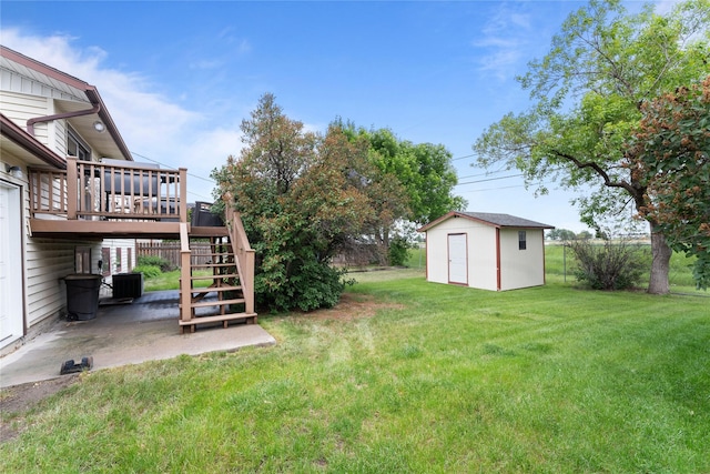 417 56th St S, Great Falls, MT 59405 - view of grassy yard featuring stairway, a patio area, and a deck