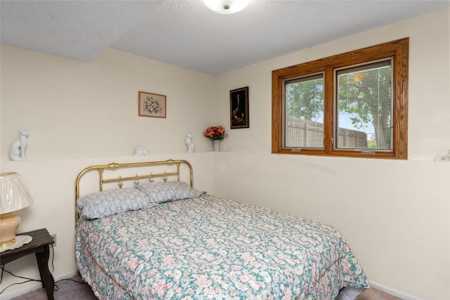 417 56th St S, Great Falls, MT 59405 - bedroom with carpet and a textured ceiling