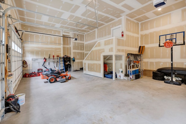 12800 Mill Creek Rd, Lolo, MT 59847 - garage featuring a garage door opener and french doors