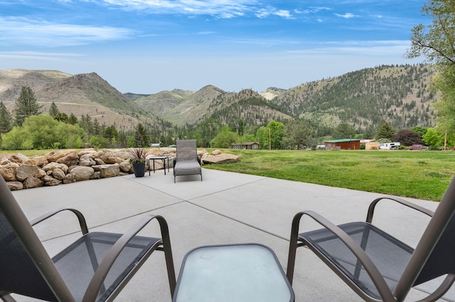 12800 Mill Creek Rd, Lolo, MT 59847 - view of patio / terrace with a mountain view