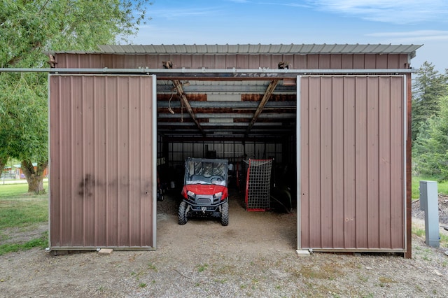 12800 Mill Creek Rd, Lolo, MT 59847 - view of pole building with a garage