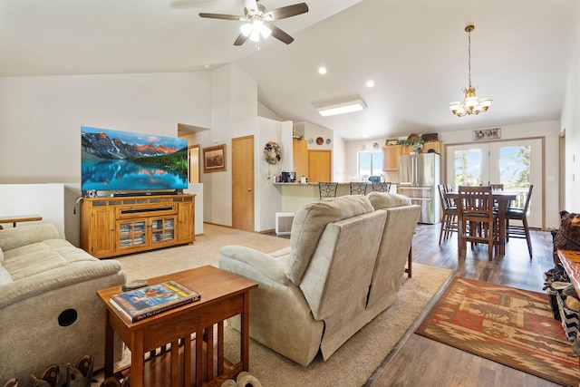 4357 Trumble Creek Rd, Columbia Falls, MT 59912 - living room with ceiling fan, a chandelier, light wood finished floors, high vaulted ceiling, and recessed lighting