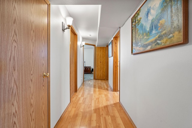 4357 Trumble Creek Rd, Columbia Falls, MT 59912 - corridor featuring light wood-style floors and baseboards