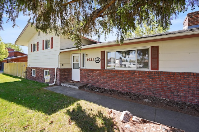 1021 Vallejo Rd, Helena, MT 59602 - tri-level home featuring brick siding
