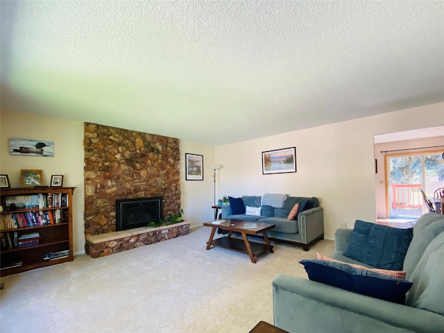 1655 Sunflower Dr, Missoula, MT 59802 - living area featuring a textured ceiling, a fireplace, and carpet flooring