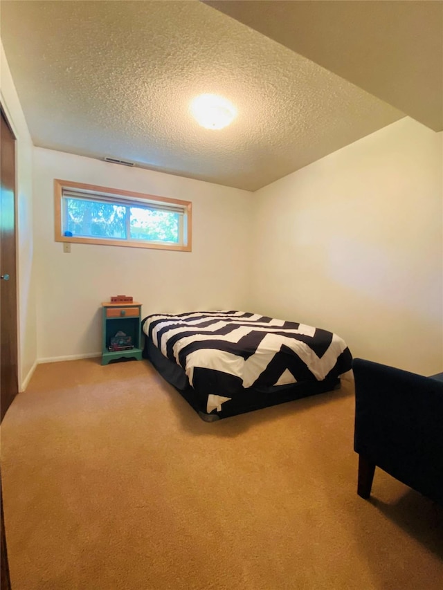 1655 Sunflower Dr, Missoula, MT 59802 - bedroom featuring carpet flooring, a textured ceiling, and baseboards