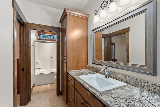 74 Wood Ridge Dr, Columbia Falls, MT 59912 - full bathroom with vanity, toilet, and shower / bath combination