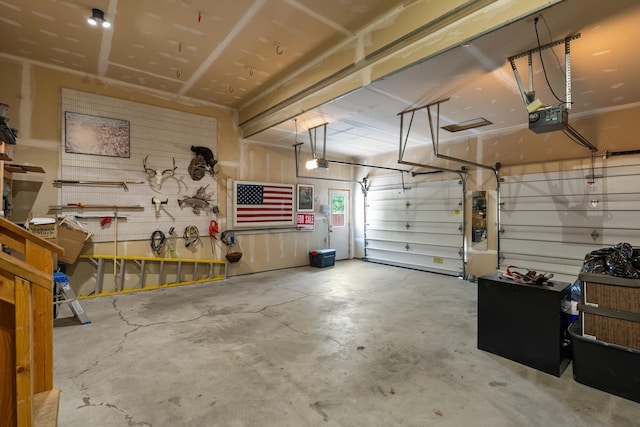 4750 Mark Ct, Missoula, MT 59803 - garage featuring a garage door opener