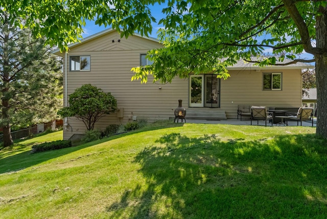 4750 Mark Ct, Missoula, MT 59803 - back of house featuring a patio