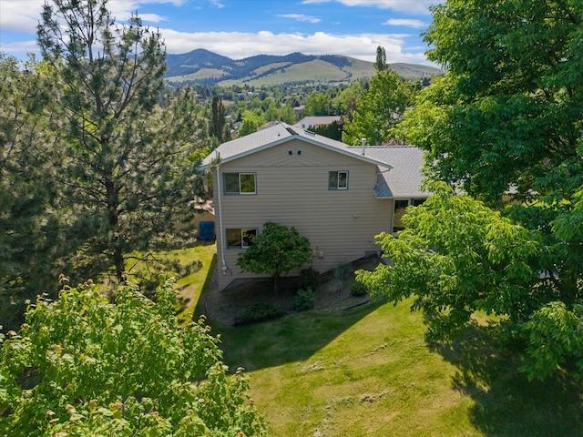 4750 Mark Ct, Missoula, MT 59803 - view of side of property featuring a mountain view and a yard