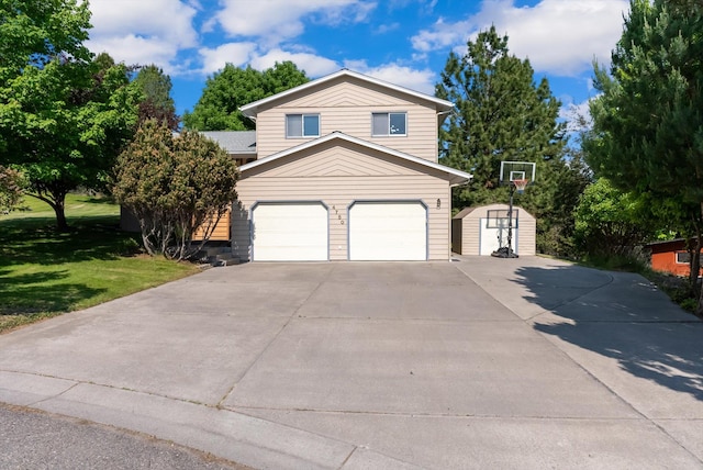 4750 Mark Ct, Missoula, MT 59803 - view of front facade with concrete driveway and a front yard