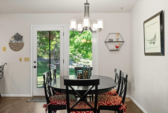 4750 Mark Ct, Missoula, MT 59803 - dining space with baseboards, a chandelier, and dark wood-style floors